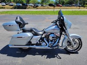 2015 Harley Davidson
Street Glide Special FLHXS
Brilliant Silver Pearl with only 3,384 miles
Equipped with 103